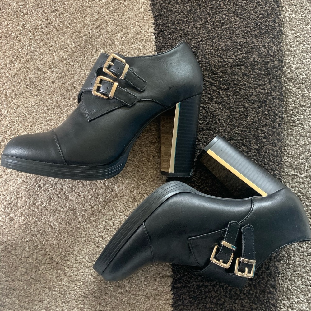 Black and gold buckle booties